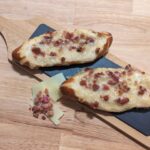 bretzel-stick-canada This picture showes two bretzel stick canada topped with cheese and bacon