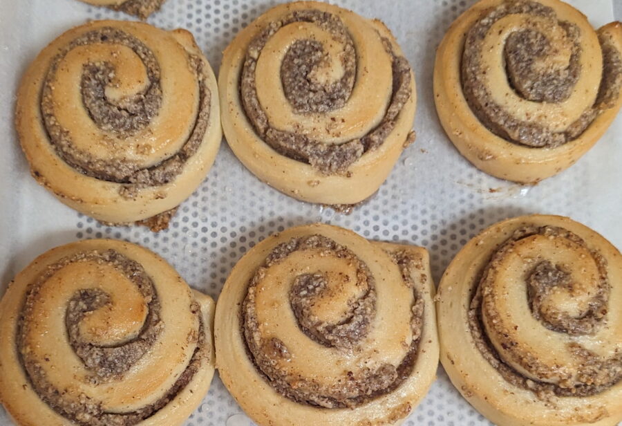 This image shows multiple hazelnut swirls on a baking tray
