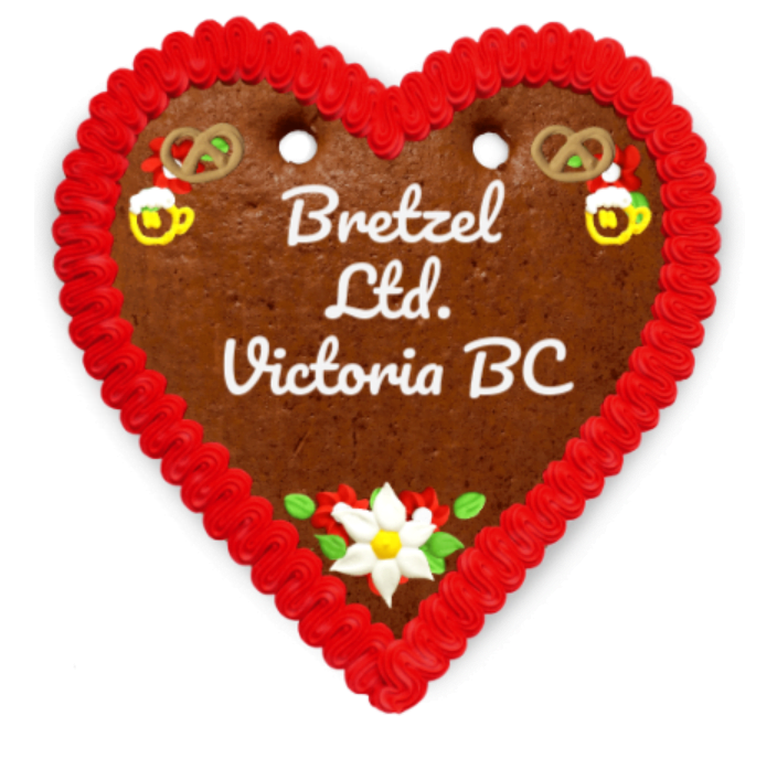 oktoberfest-love-heart Festive Oktoberfest Love Hearts gingerbread cookies with colorful icing and customizable inscriptions.